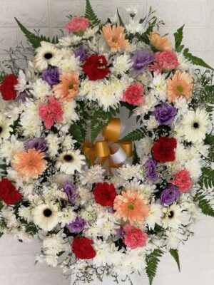 sunflower bouquet with cake, wine, and chocolate