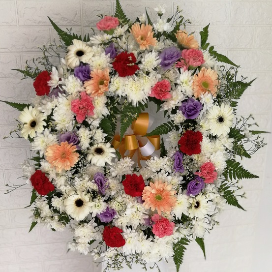 edf sunflower bouquet with cake, wine, and chocolate