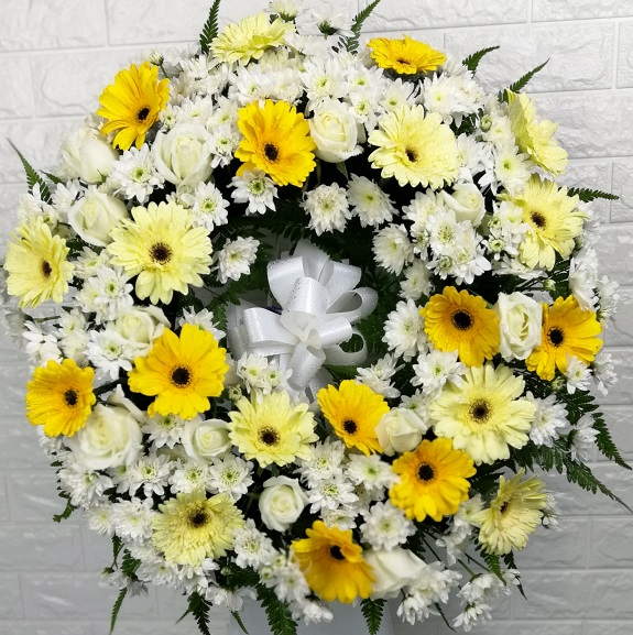 edf white lilies and white gerbera in a vase
