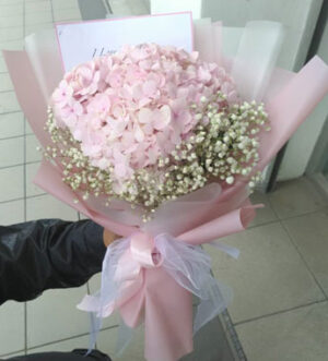 pink baby breath hand bouquet