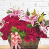 roses lilies in basket arrangement