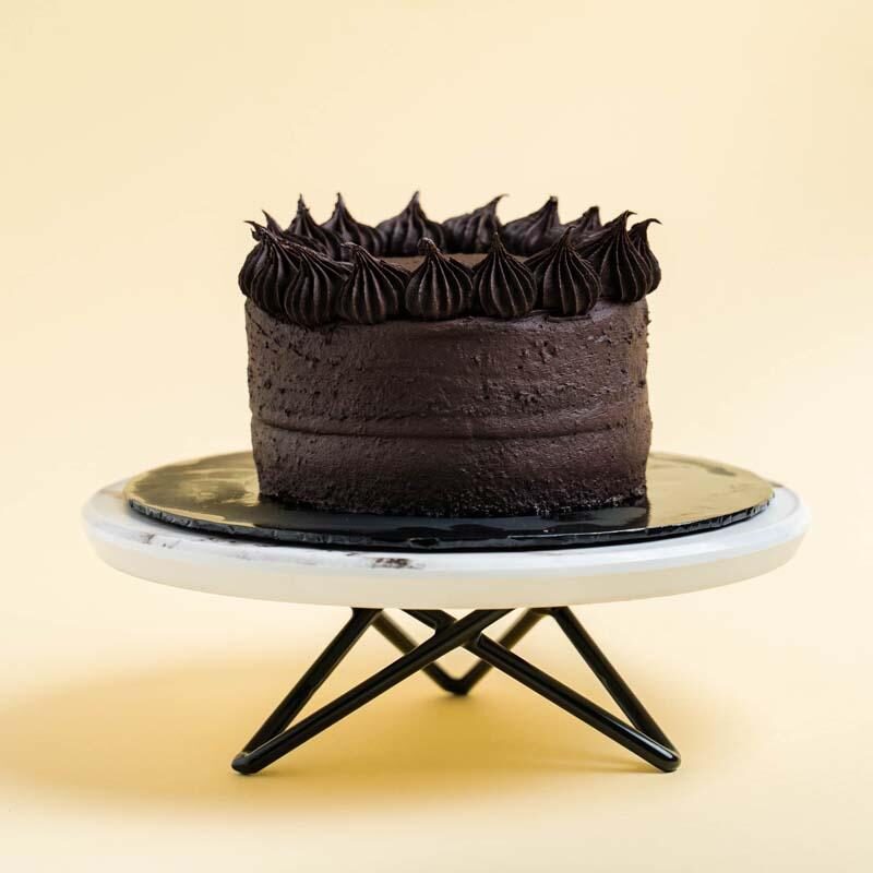 sunflower bouquet with cake, wine, and chocolate