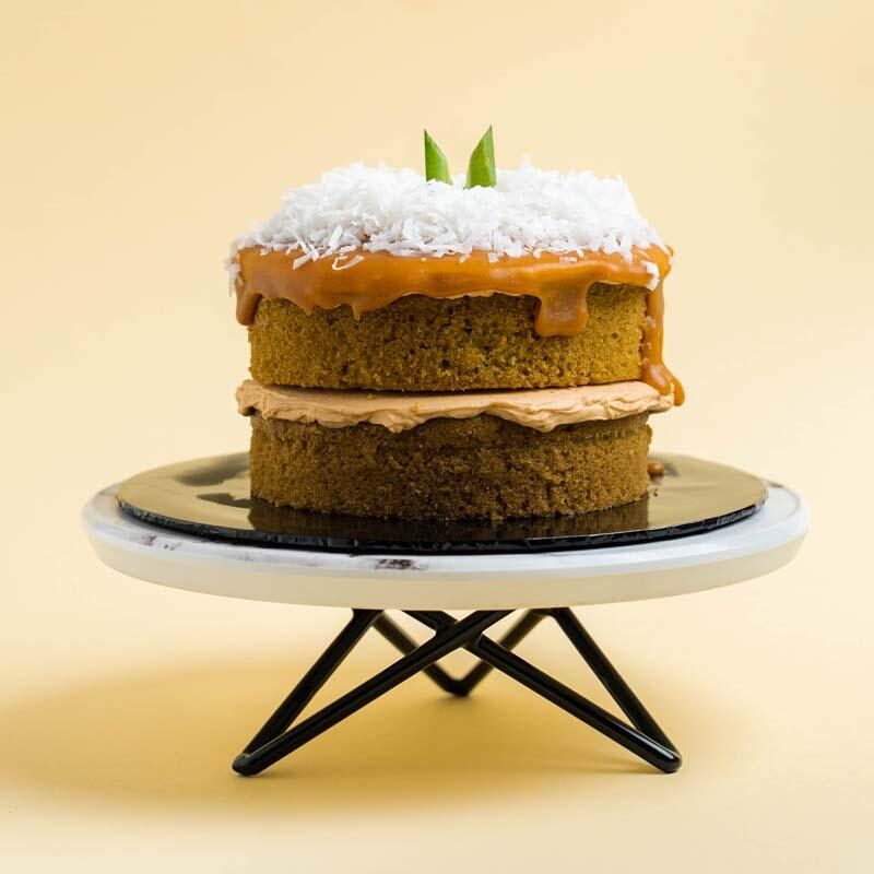 sunflower bouquet with cake, wine, and chocolate