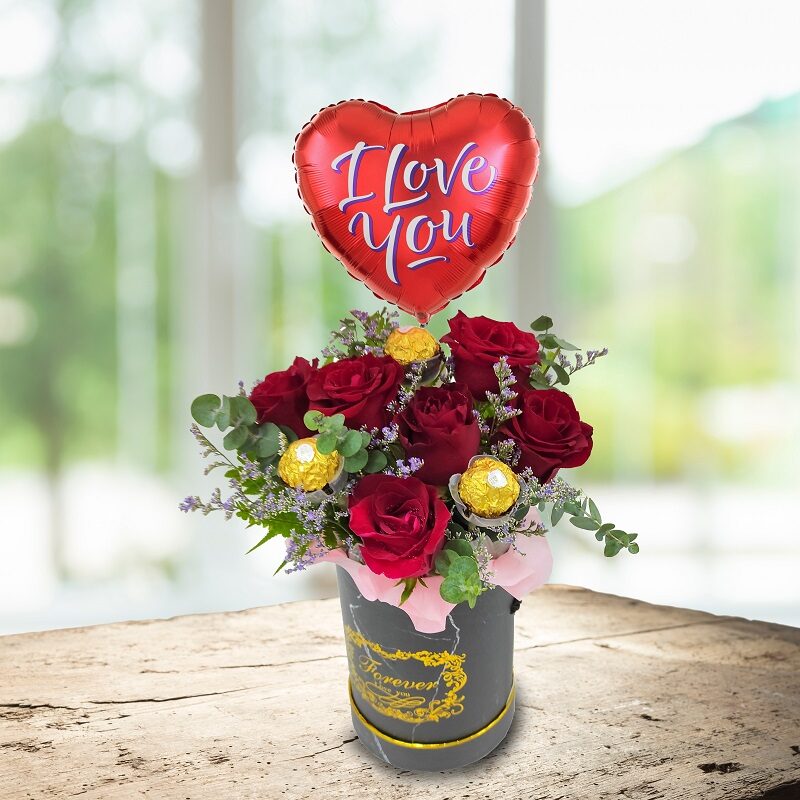 roses and ferrero rocher box arrangement